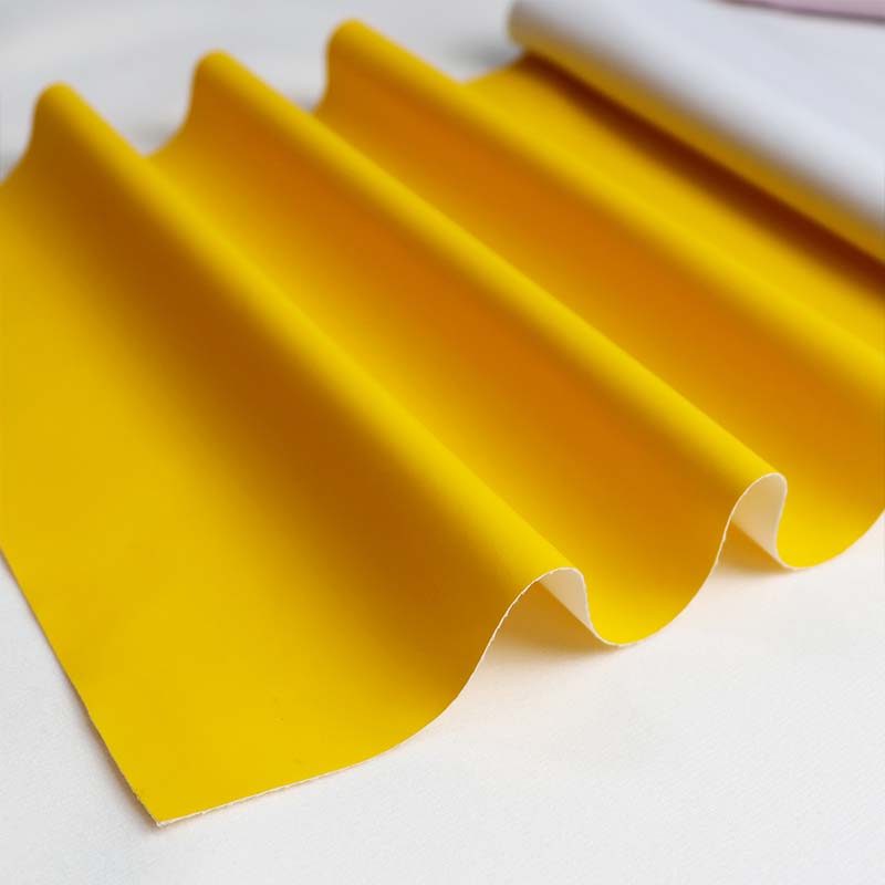 Pustende vanntett regnfrakk PU-skinnstoff