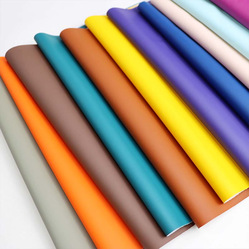 Pustende vanntett regnfrakk PU-skinnstoff