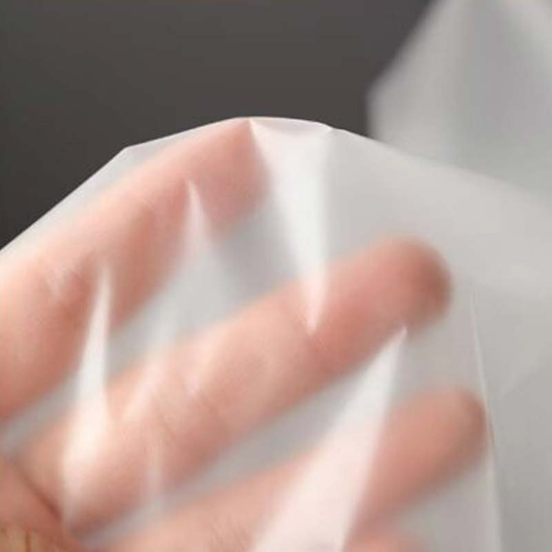 Gjennomsiktig TPU regnfrakk skinn